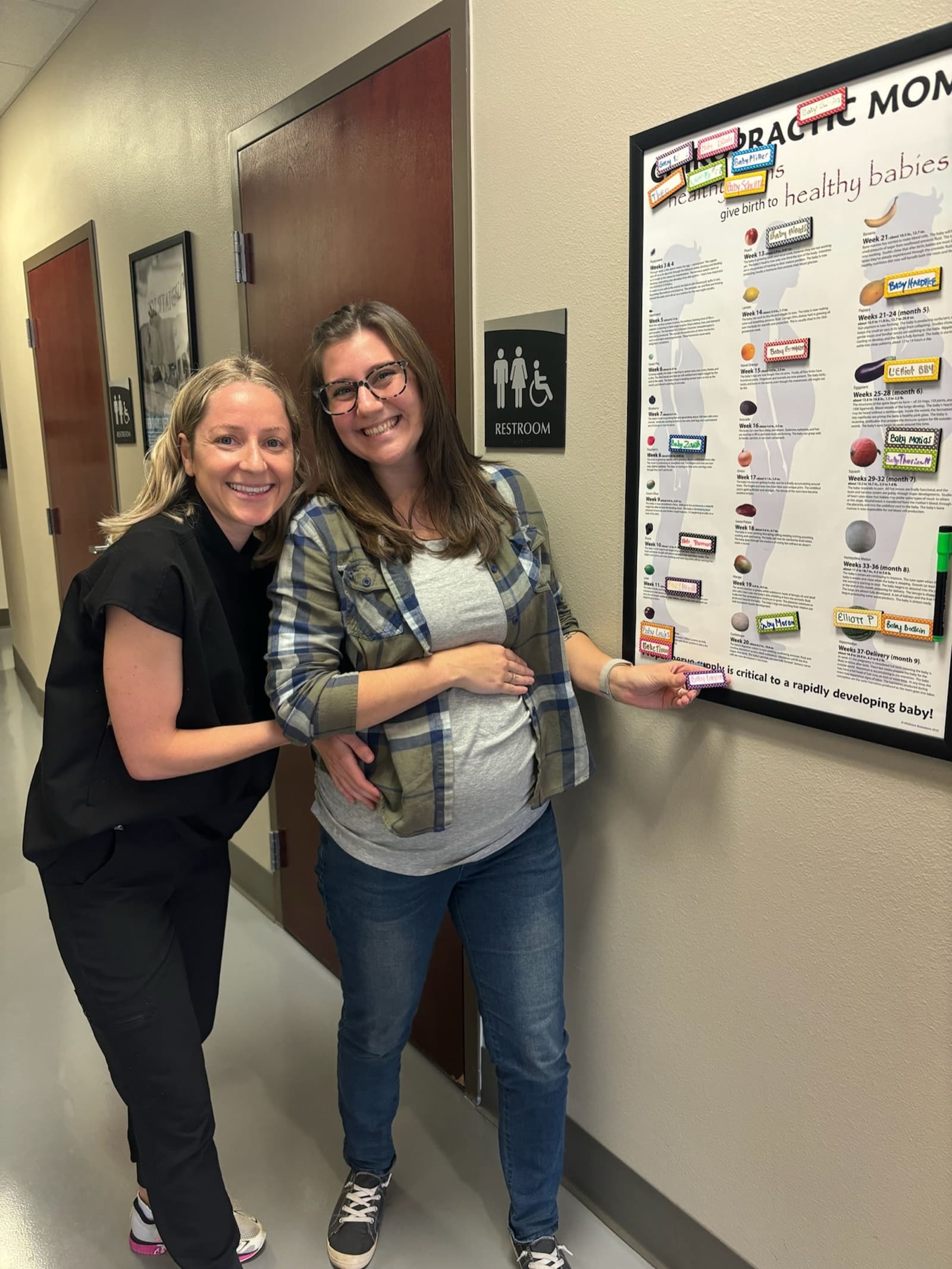Dr. Laura Swaim working with a patient at Little Roots Pediatric Chiropractic