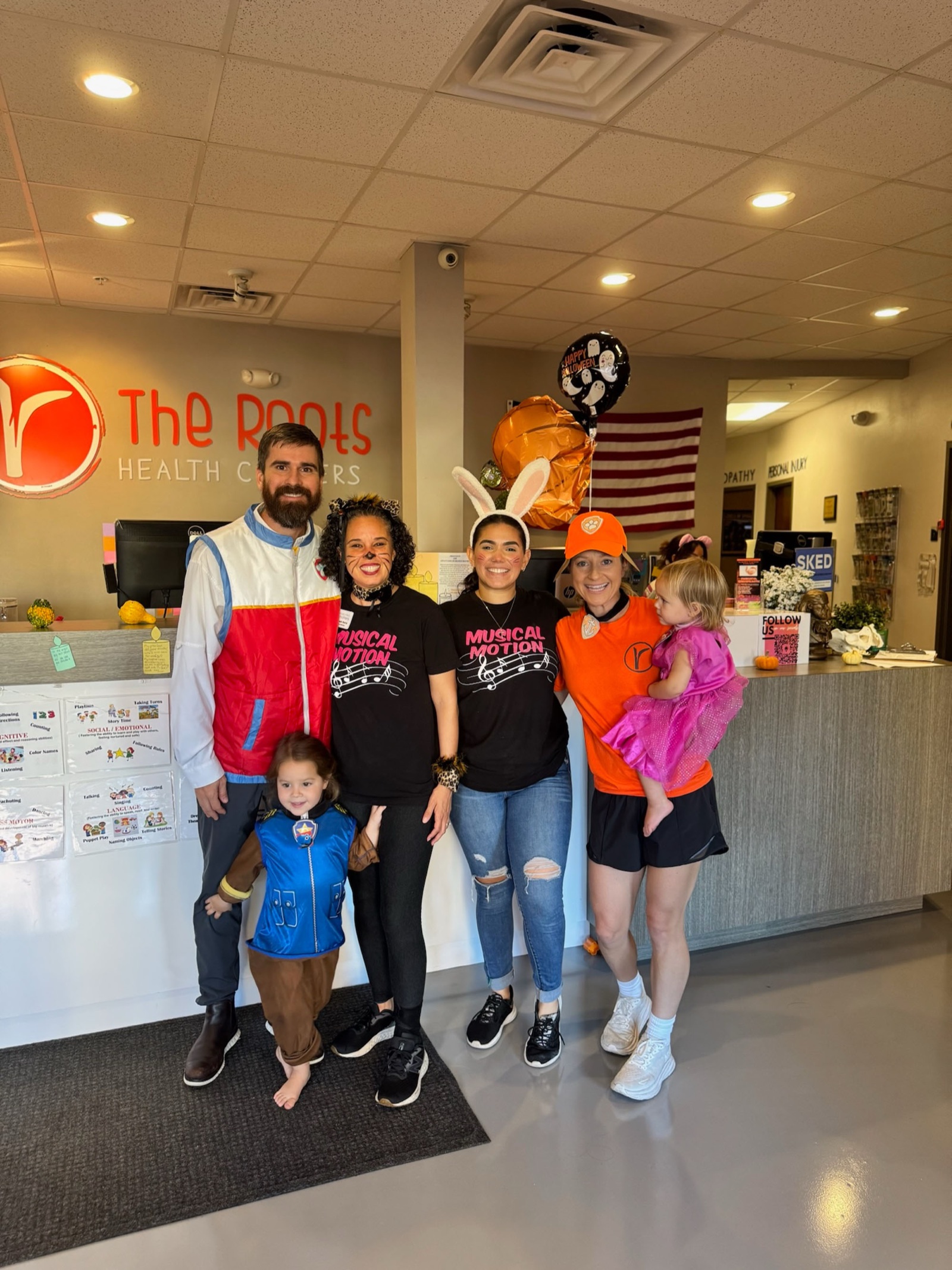 Dr. Laura with her family at a community event in the clinic.
