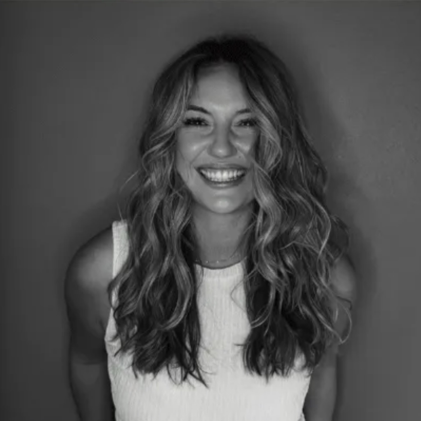 Portrait of Carly Lovato, chiropractic assistant at Little Roots.